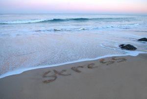 Stress-drmitchkeil-newport-beach-beach-with-stress-drawn-on-the-beach-mage